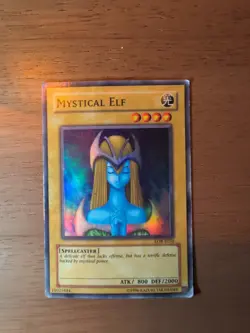 YUGIOH Super Rare Mystical Elf LOB-E050 PLAYED - Image 1