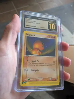 (POP 27) CGC 10 PRISTINE 2003 EX Sandstorm 82/100 Trapinch pokemon Card - Image 2
