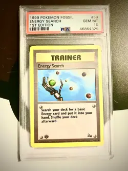 1999 POKEMON FOSSIL 1ST ED #59 ENERGY SEARCH PSA 10 - Image 1