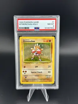1999 POKEMON BASE SET UNLIMITED #7 HITMONCHAN-HOLO PSA 8 - Image 1