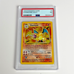 1999 POKEMON BASE SET UNLIMITED #4 CHARIZARD-HOLO PSA 7 - Image 1