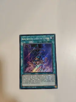 Band Zwischen Lehrer Und Schuler BLGG-DE109 Secret Rare DE NM Yugioh - Image 1