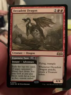 MTG Wilds of Eldraine - Decadent Dragon / Expensive Taste rare R 0223 - Image 1