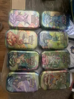 Pokemon Prismatic Evolutions Mini Tins Set of 8 All Artwork Sealed - Image 1