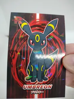 2025 POKEMON ROCKET TEAM CARD DATABASE UMBREON PERU - Image 1