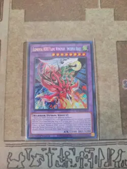 YUGIOH ELEMENTAL HERO FLAME WINGMAN INFERNAL RAGE BLMR-EN012 SECRET 1ST ED NM - Image 1