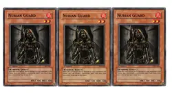 Yugioh- 3X Nubian Guard - Common - 1st Edition - AST-066 - Near Mint - Image 1