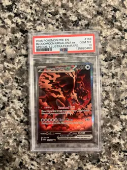 2025 POKEMON PRISMATIC EVOLUTIONS BLOODMOON URSALUNA 168/131 EX SIR PSA 10 - Image 1