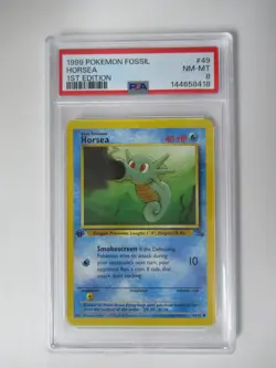 1999 Pokemon Fossil 1st Edition Horsea #49/62 PSA 8 - Image 1