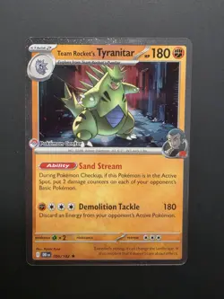 Team Rocket’s Tyranitar 096/182 Pokemon Center Destined Rivals Card - Image 1