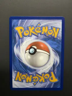 Team Rocket’s Tyranitar 096/182 Pokemon Center Destined Rivals Card - Image 2