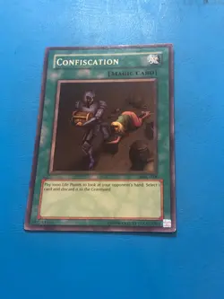 YUGIOH Super Rare Confiscation MLR-038 PLAYED - Image 1