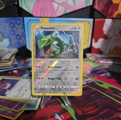 Rayquaza 106/145 Guardians Rising Reverse Holo Pokemon Card NM - Image 1