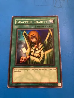 YUGIOH Super Rare Graceful Charity SDP-040 PLAYED - Image 1
