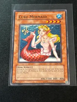 1996 Yu-Gi-Oh! Cure Mermaid Fish / Effect Card ATK / 1500 DEF / 800 LON-041 - Image 1