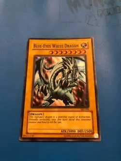 YUGIOH Super Rare Blue-Eyes White Dragon SKE-001 PLAYED - Image 1