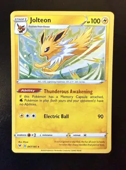 Jolteon (Cosmos Holo) 047/185 SWSH04: Vivid Voltage Rare Pokemon Card - Image 1