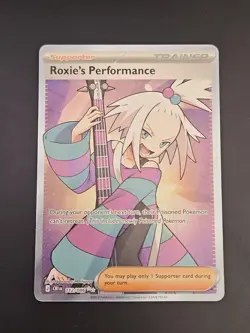 Pokemon TCG - Roxie's Performance 112/086 Me04: Chaos Rising Holo - Image 1