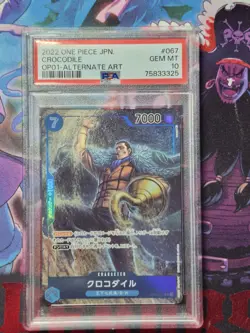 PSA 10 GEM MINT JAPANESE ONE PIECE 2022 CROCODILE OP01-067 ALTERNATE ART - Image 1
