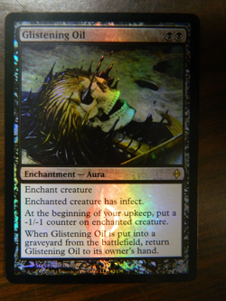 MTG FOIL New Pyhrexia Glistening Oil Unplayed Near Mint Condition - Image 1