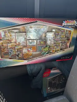 Pokemon TCG Prismatic Evolutions Lucario Ex + Tyranitar Ex Premium Collection - Image 1