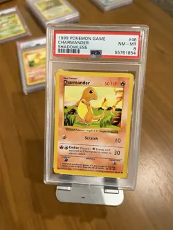 1999 Shadowless Charmander Base Set PSA 8 Near Mint - Image 1