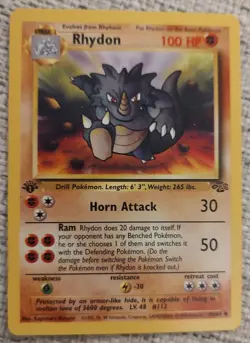 1999 Pokemon Jungle 1st Edition Rhydon #45/64 HP Damage Back - Image 1