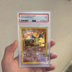 Wizards of the Coast Charizard 4/102 Base Set Holo PSA 7 Pokemon TCG - Image 1