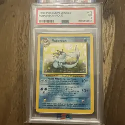 1999 Pokemon Jungle Vaporeon Holo #12 PSA 7 NM - Wizards of the Coast Vintage - Image 1