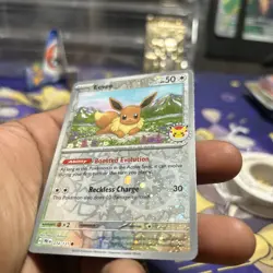 Eevee 74/131 Prismatic Evolutions 2025 Pokemon Day - NM - Image 3
