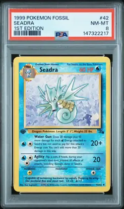 1999 POKEMON FOSSIL 42 SEADRA 1ST EDITION PSA 8 - Image 1