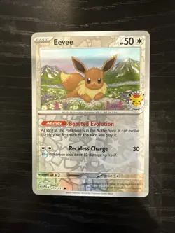 Pokemon Day 2025 Eevee 074/131 Reverse Cosmos Holo-Prismatic Evolutions - Image 1