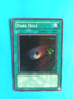YUGIOH DARK HOLE DB1-EN113 UNLIMITED SUPER RARE HOLO LIGHT PLAY - Image 1
