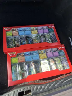 1 Pack Pokemon Prismatic Evolutions 8 Mini-Tins with Promo Cards - Image 1