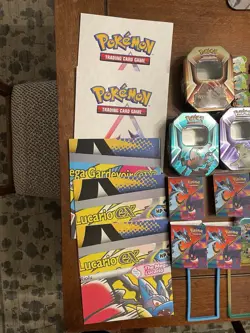 Pokemon TCG - Accessories LOT (Tins, Posters, Sleeves, Mini-Binders, Pins, Pogs) - Image 2