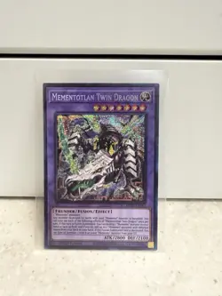 Yu-Gi-Oh! Mementotlan Twin Dragon 1st Edition Prismatic Secret Rare MP25-EN067 - Image 1