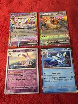 4 Card Eeveelution Pokemon Card Lot-Eevee, Sylveon, Vaporeon - Image 1