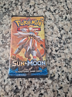 Pokemon Sun and Moon Base Set Booster Pack - Image 1
