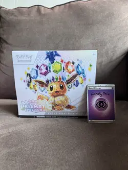 Pokemon Prismatic Evolutions ETB Elite Trainer Sealed with small tears - Image 1