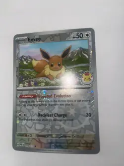 Eevee - 074/131 (Pokemon Day 2025) (Reverse Cosmos Holo) Prismatic Evolution - Image 1