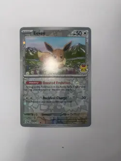 Eevee - 074/131 (Pokemon Day 2025) (Reverse Cosmos Holo) Prismatic Evolution - Image 4