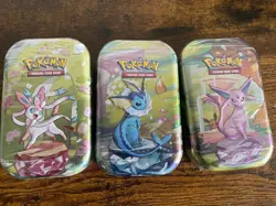 Pokemon Scarlet & Violet Paldea Evolutions Sylveon Vaporeon Espeon Mini Tin Set - Image 1