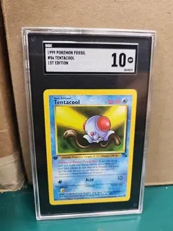 TENTACOOL 1ST EDITION SGC 10 GEM MINT 1999 POKEMON FOSSIL 56 ENGLISH - Image 1