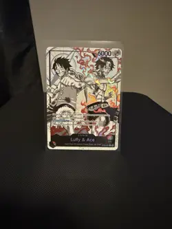ST30-001 - Luffy & Ace Leader (Alternate Art Parallel - Black/White) - Near Mint - Image 1