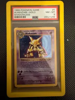 1999 POKEMON BASE SET SHADOWLESS #1 ALAKAZAM-HOLO PSA 8 - Image 1