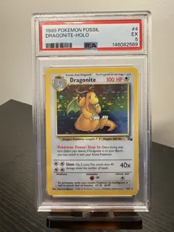 1999 POKEMON FOSSIL #4 DRAGONITE-HOLO PSA 5 - Image 1