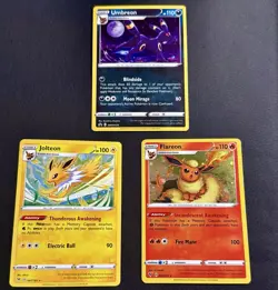 Pokemon promo cards eeveelutions Umbreon SWSH129 Cosmos Holo trio holo TCG NM - Image 1