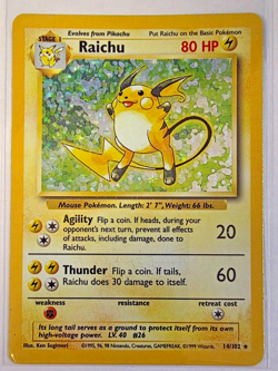 Raichu 14/102 Holo Rare Base Set Pokemon Card - Image 1