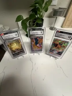 TCG Pokemon Graded Lot Of (3) Ninetales CGC 10 Charizard CGC 10 - Image 1