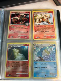 Binder of Pokemon Cards: Rares, Holos, lightly used; Celebi, Jirachi, Charizard - Image 4